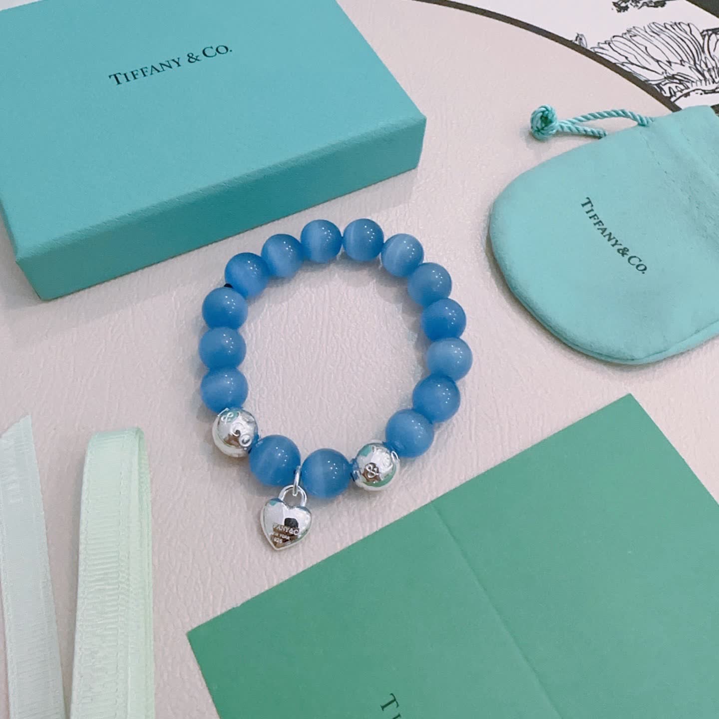 Tiffany & Co. Blue Beaded Bracelet with Lock Charm